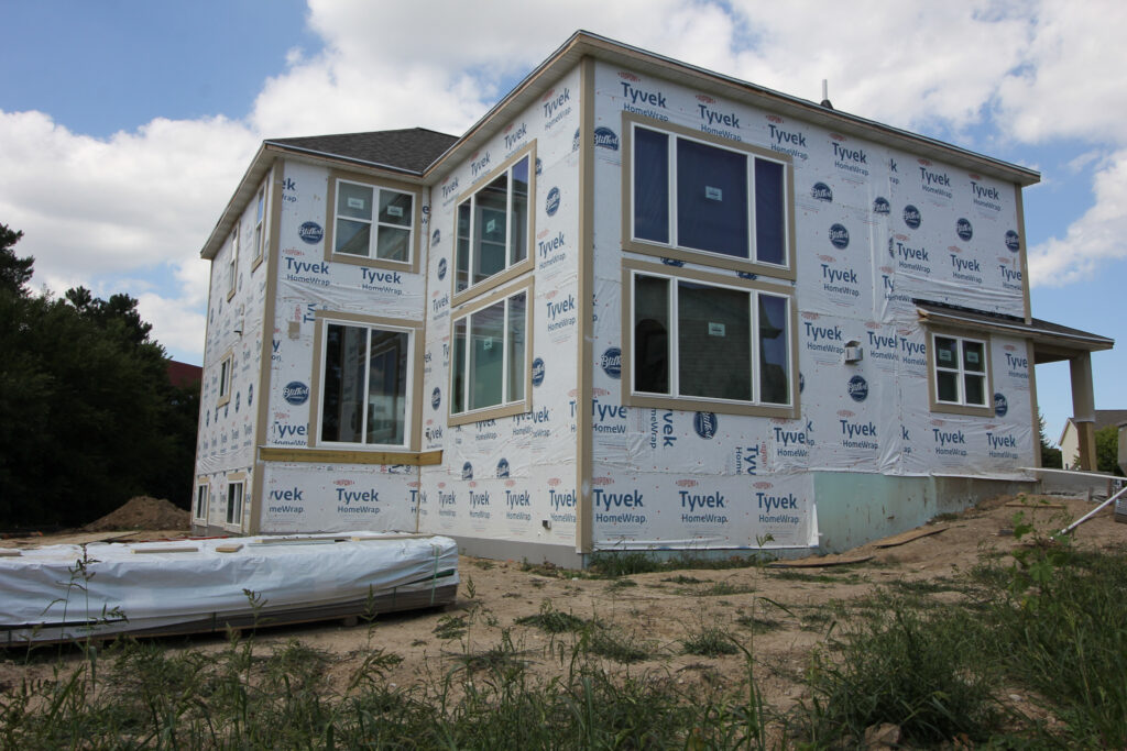 Home exterior wrap on new custom home build in WI