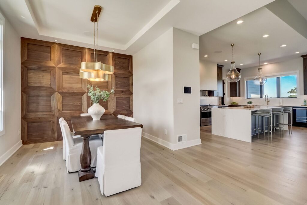 Custom designed dining room with walnut accent wall 